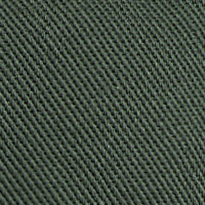 Close-up of Crest Bucket Hat's green woven fabric with a diagonal ribbed texture pattern.