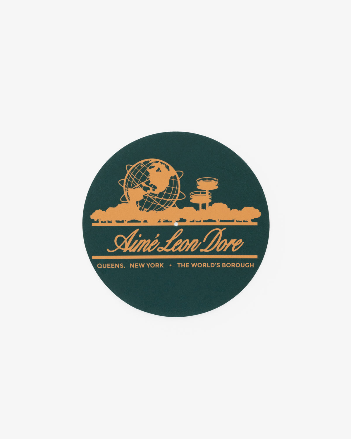 Green slip mat with yellow Unisphere, skyline, Aimé Leon Dore text; reads Queens, New York - The World's Borough.