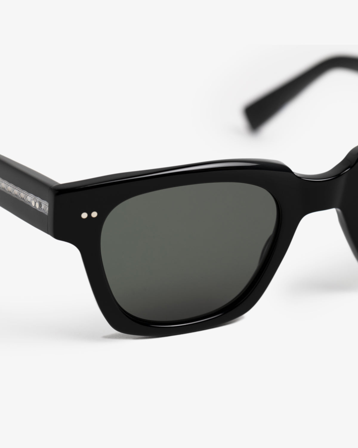 Close-up of Gallo Sunglasses with black frames, dark lenses, and silver arm detail on a white background.