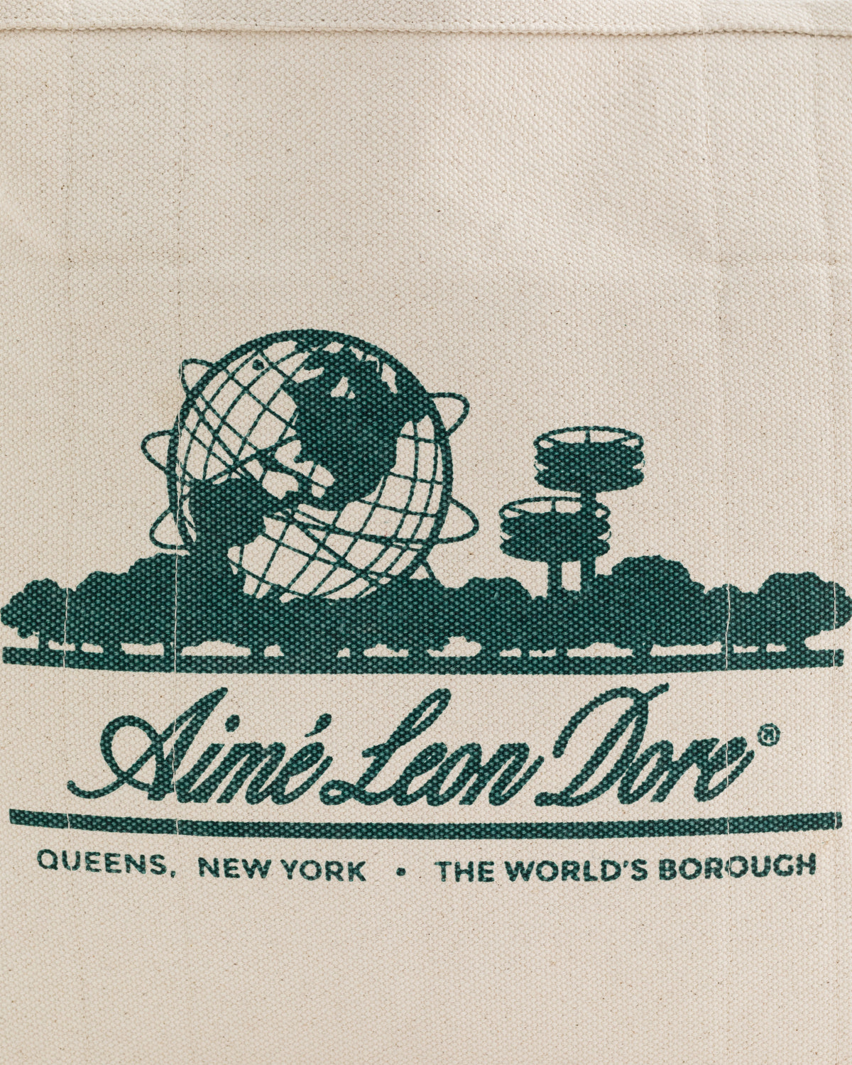 Small Unisphere Tote Bag featuring a green Aimé Leon Dore logo with globe, trees, and Queens, NY text.