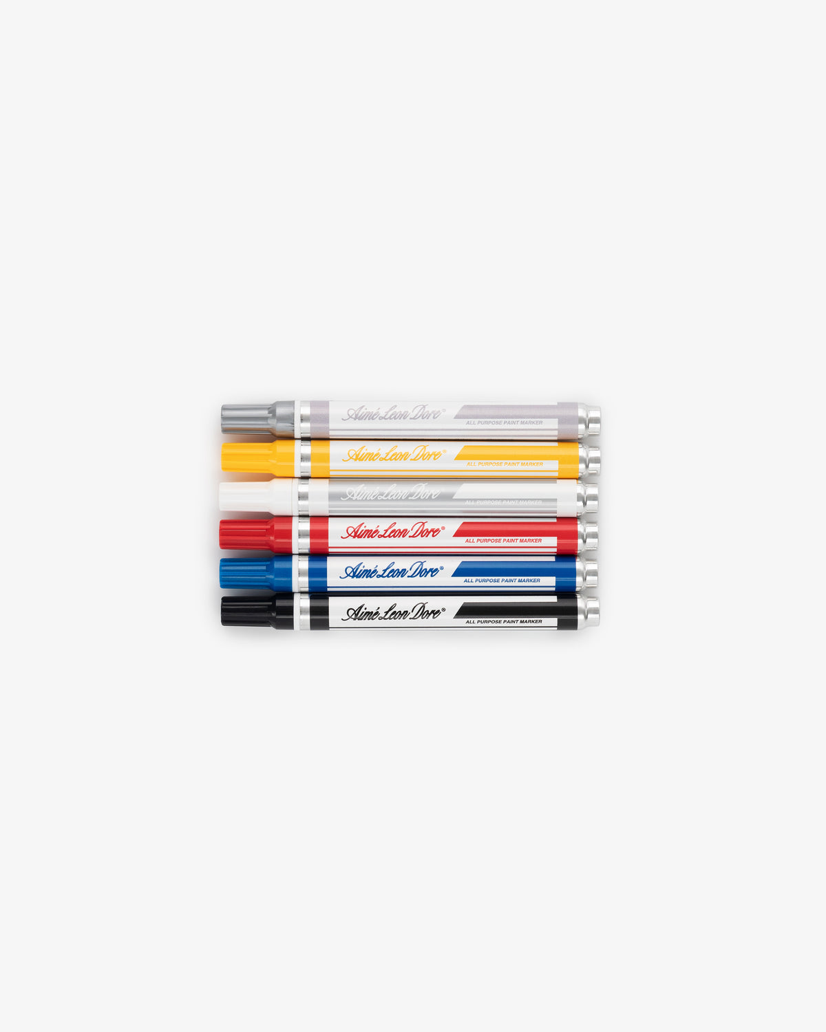 Five Paint Marker Pack markers (black, yellow, red, blue, silver) are lined up horizontally on a white background.