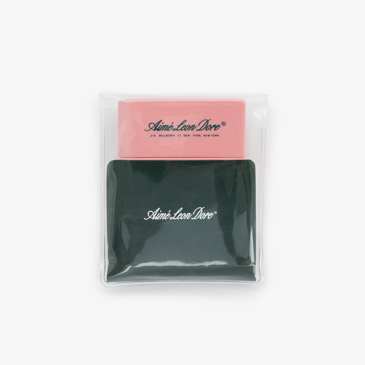 A pink eraser from the Eraser 3 Pack and a black Aimé Leon Dore item in a clear pouch on a white background.